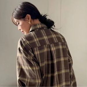 Plaid Button Up shirt with gold Zipper on sleeve and side
Size small